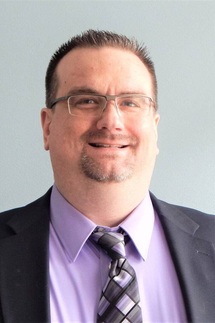 Chris Short in office pic Heartland retirement group